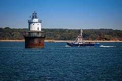 Ship Approaches Butler Flats Lighthouse in Massachusetts